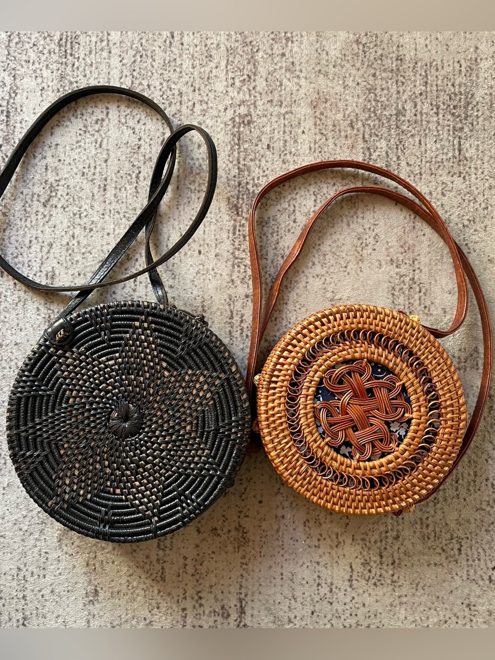 2 Round Rattan Crossbody Bag - Black and light brown.